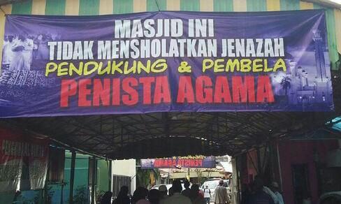  Terkait Spanduk Tolak Jenazah Pendukung Penista Agama, MUI: Hanya Alloh yang Berhak Menilai Kafir atau Munafik